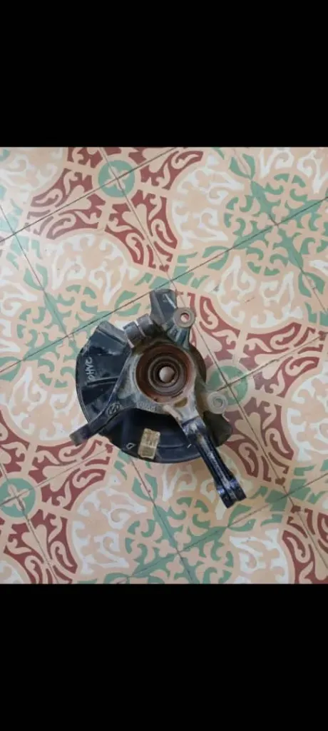 Muñon delantero derecho con cubos de ruedas